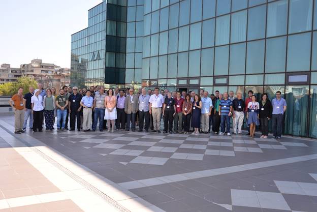 A group of people on a city street

Description generated with very high confidence