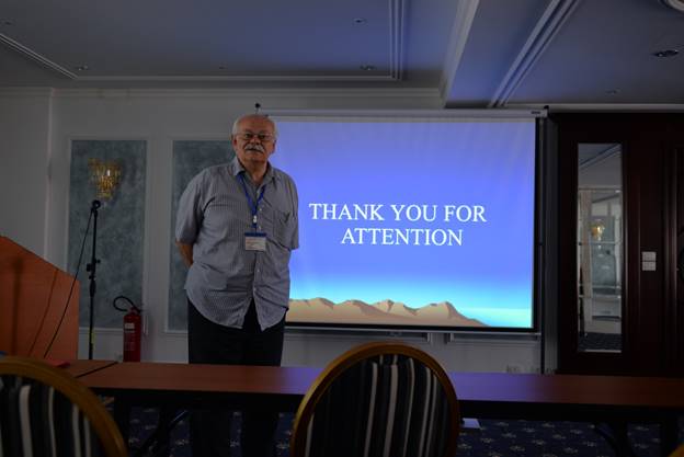 A person standing in front of a television

Description generated with very high confidence