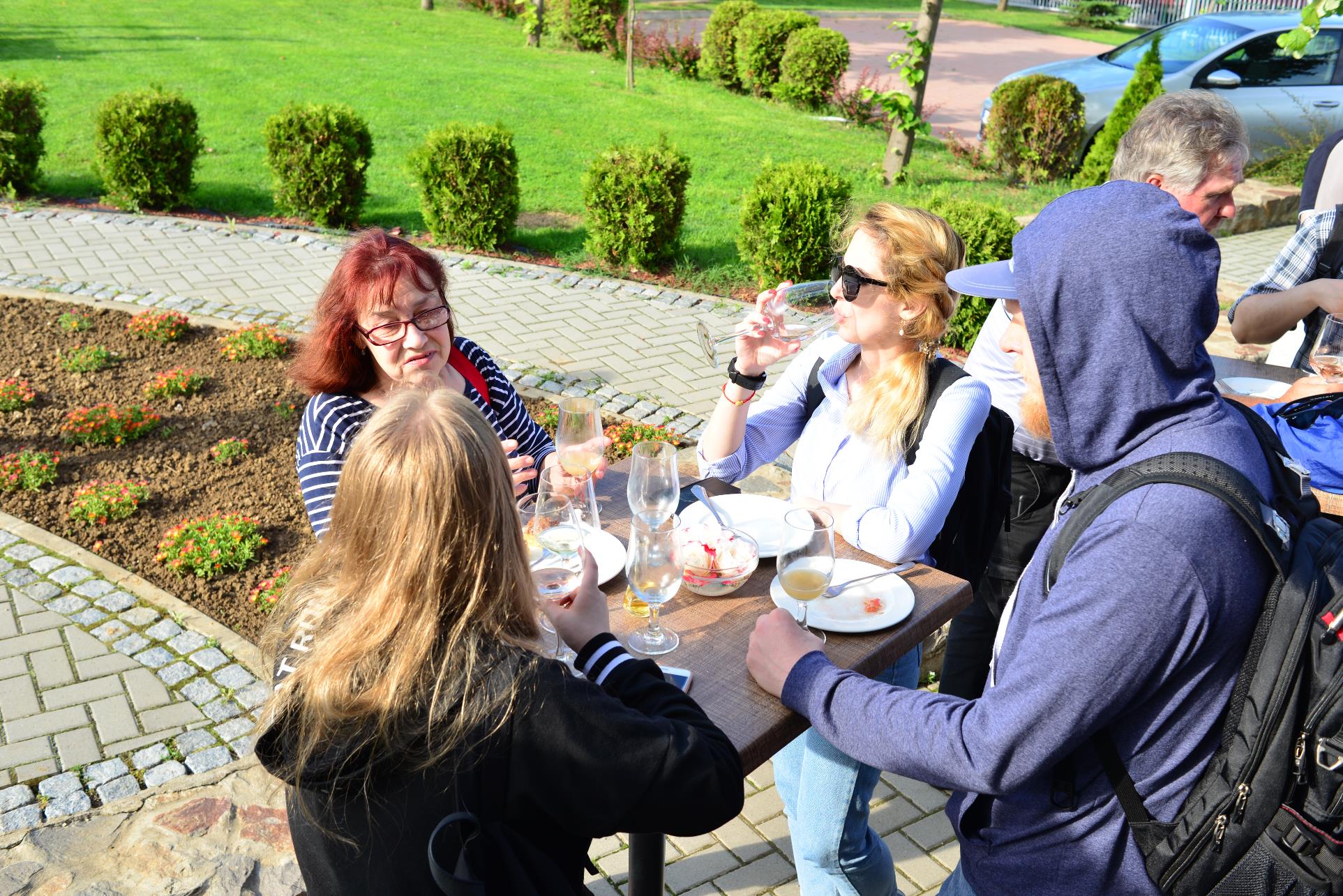 A group of people sitting at a table

Description automatically generated